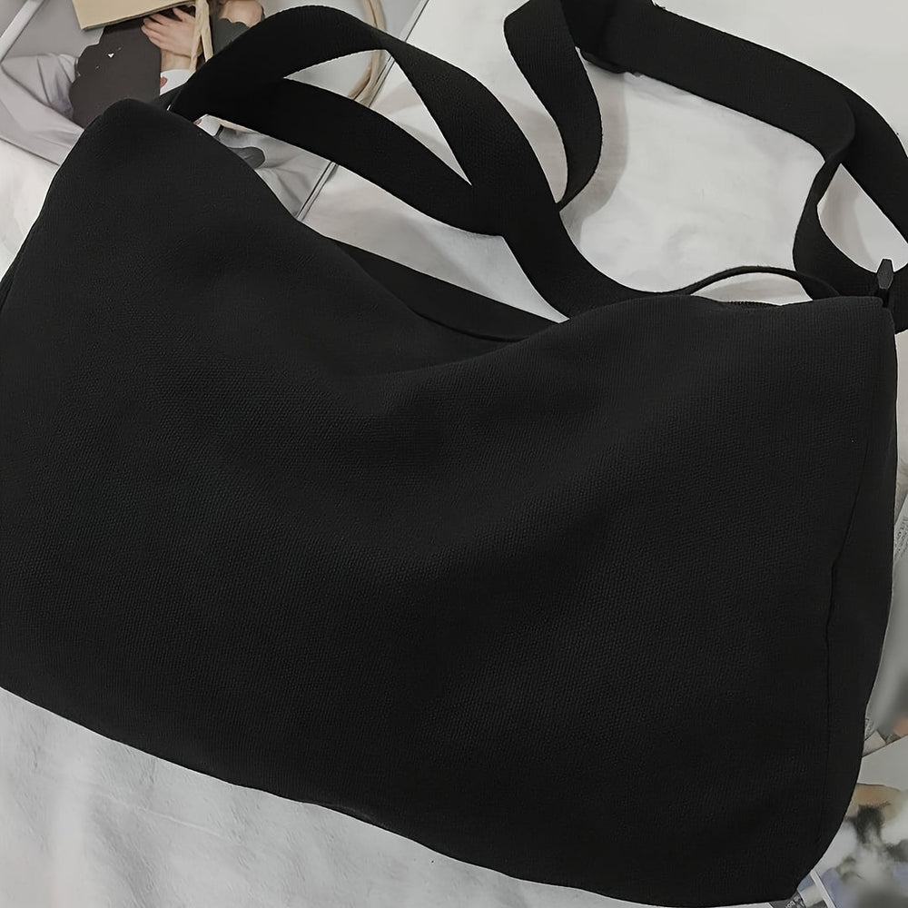 Detailopname van de zwarte crossbody tas voor heren