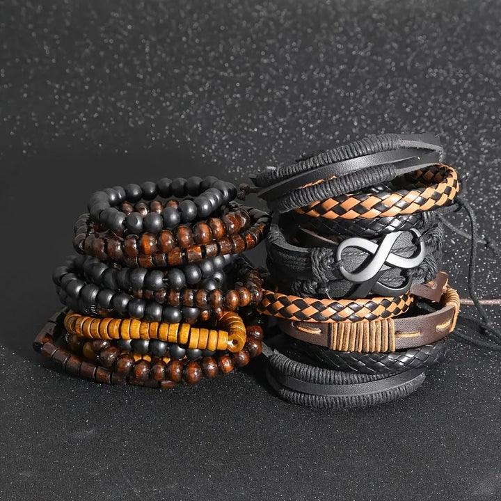 Stoere heren armbandenset met diverse stijlen, perfect om gelaagd te dragen. Moderne mannenmode accessoire.