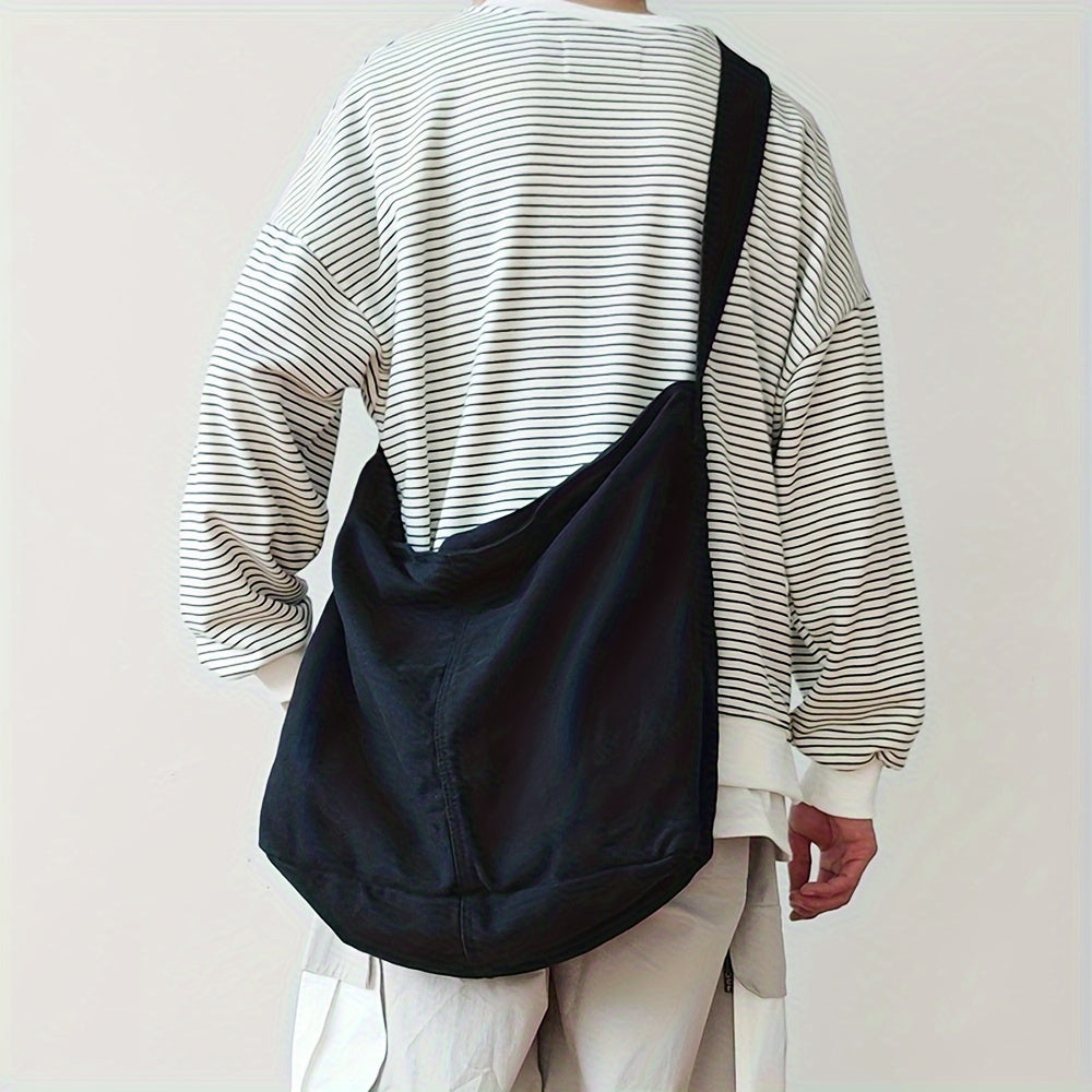Heren canvas schoudertas, minimalistisch & stijlvol, perfect voor werk of school. Duurzaam en ruim.