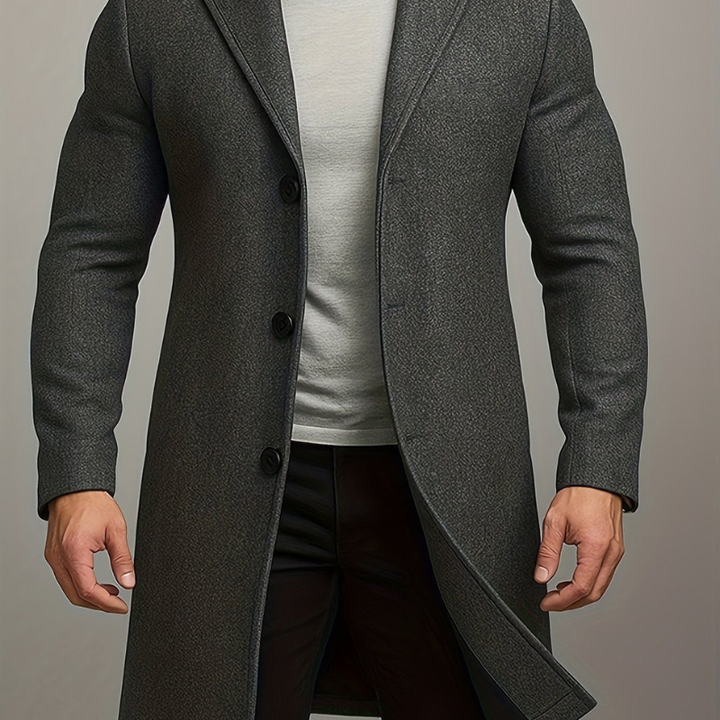 Casual en formele lange heren winterjas. Stijlvolle mantel met knoopsluiting, ideaal voor diverse winterlooks.