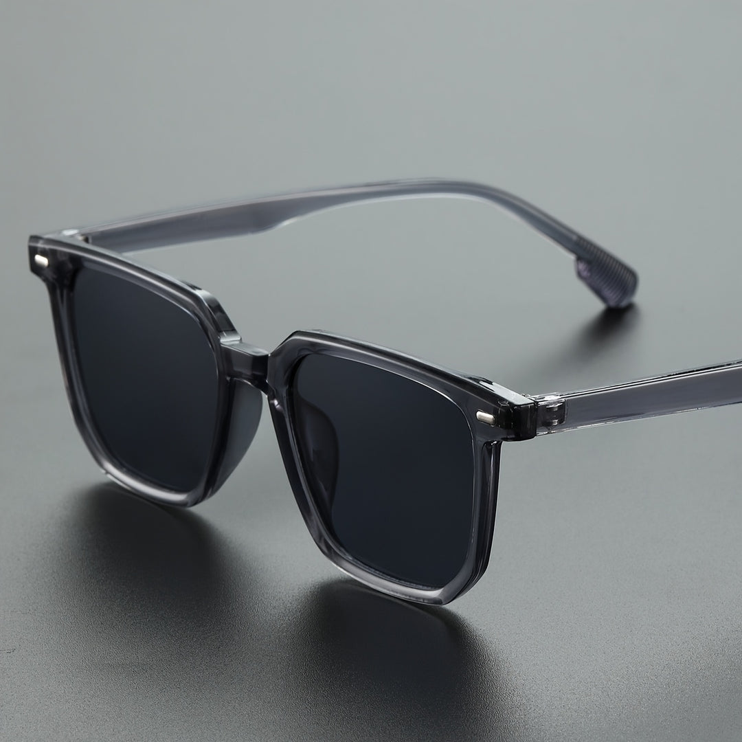 Moderne vierkante heren zonnebril, vintage look. Grijs montuur en lenzen. Een comfortabel en trendy eyewear accessoire.