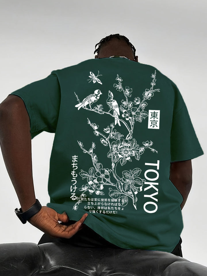Stijlvol heren T-shirt met gedetailleerde bloemen- en vogelprint, ronde hals, korte mouwen.