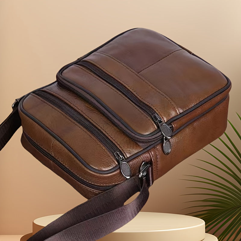 Elegante zwarte leren heren schoudertas, perfect als zakelijke tas met veel opbergruimte.