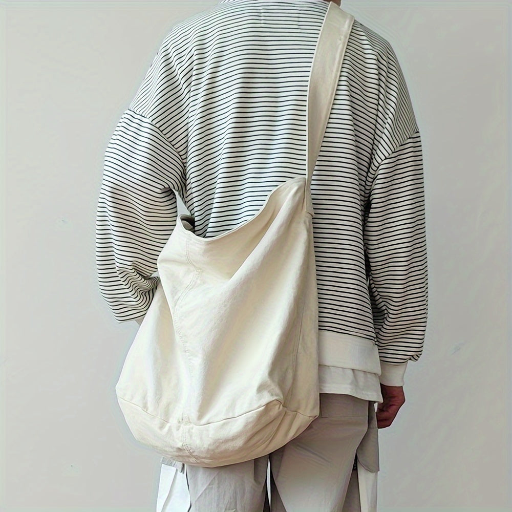 Verstelbare canvas crossbody tas voor heren, ideaal voor dagelijks gebruik, school of kantoor. Stijlvol accessoire.