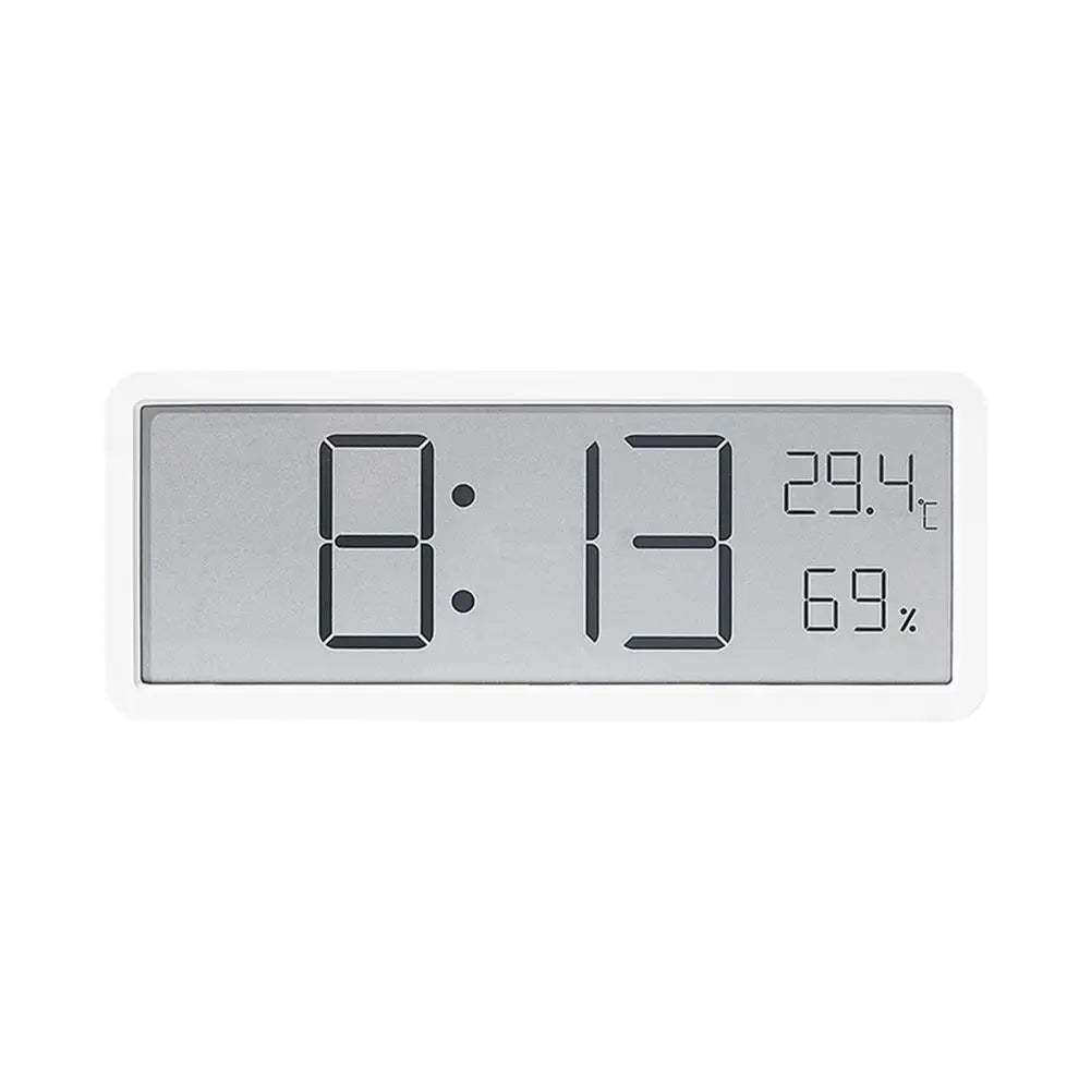 "Grote digitale wandklok met helder LED display, temperatuur- en vochtigheidssensor, ontwerp voor huis en kantoor."