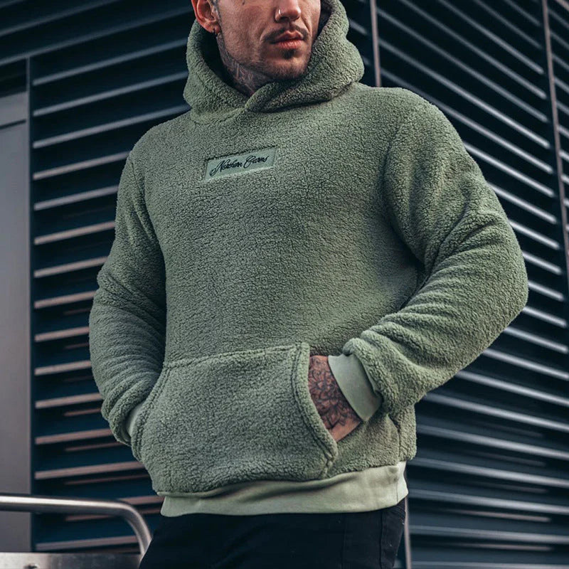Heren hoodie met relaxte pasvorm, ideaal voor casual vrijetijd; comfortabel en stijlvol voor elke gelegenheid.