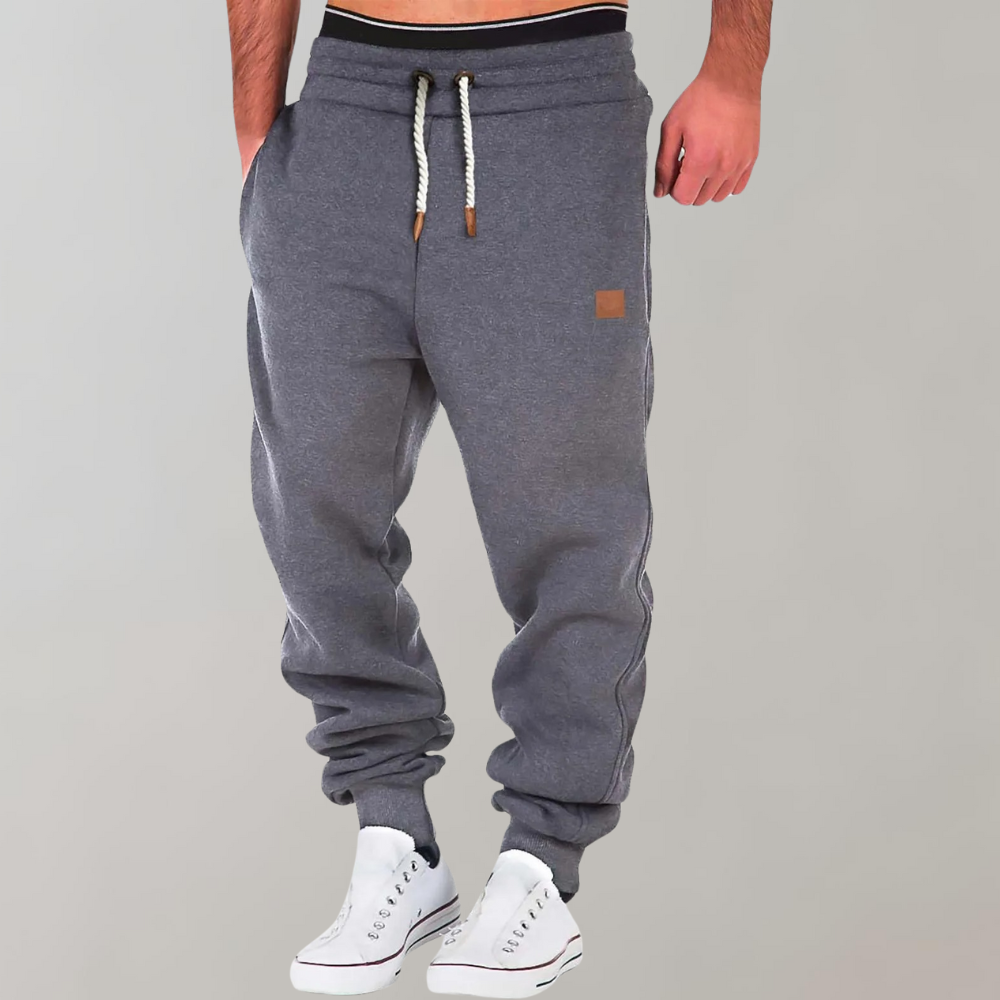 "Heren joggingbroek met zachte, ademende stof en verstelbare tailleband voor ultiem comfort en veelzijdigheid."