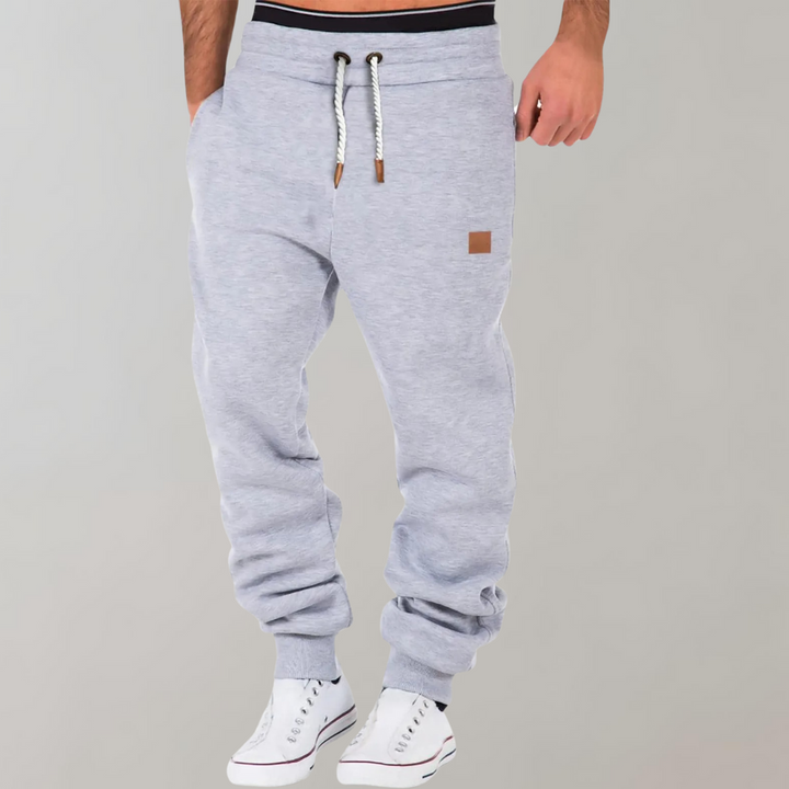 "Heren joggingbroek met zachte, ademende stof en verstelbare tailleband voor ultiem comfort en veelzijdigheid."