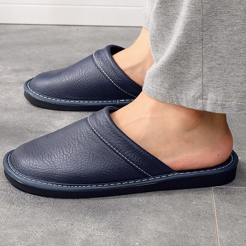 Heren leren pantoffels van hoogwaardig leder met zachte voering en duurzame zool, stijlvol ergonomisch ontwerp voor comfort.