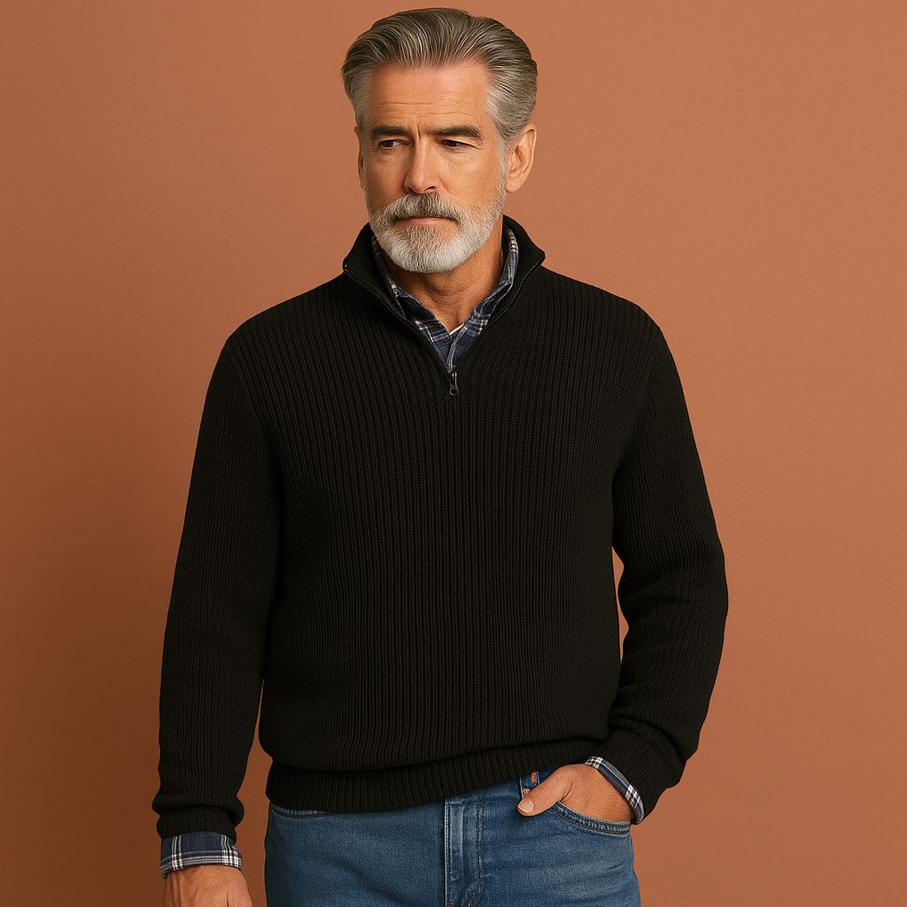 Stijlvolle heren oversized trui gecombineerd met jeans voor een trendy casual look.