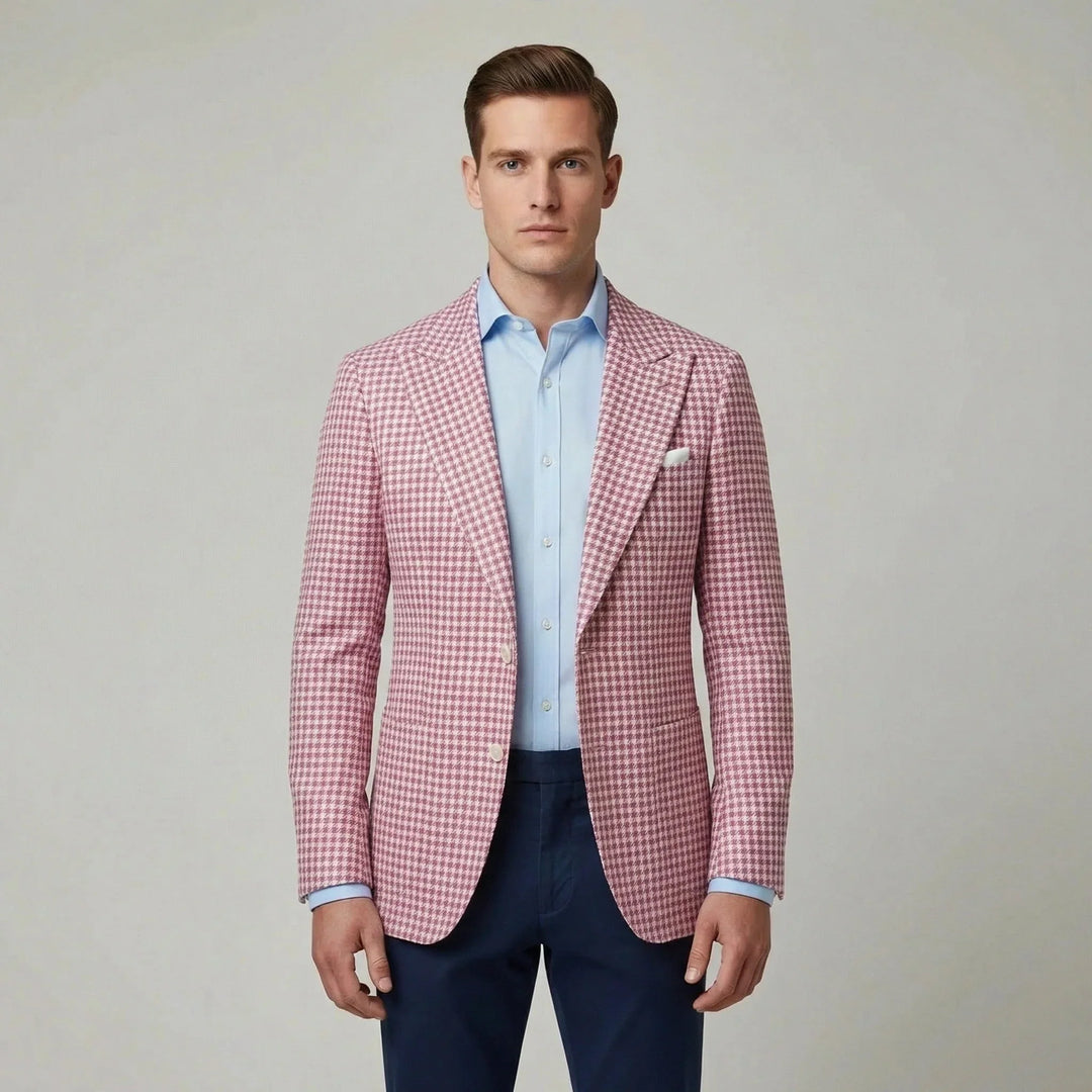 Roze, grijs, wit heren pied-de-poule blazer met klassieke revers. Perfect colbert voor diverse zakelijke settings.