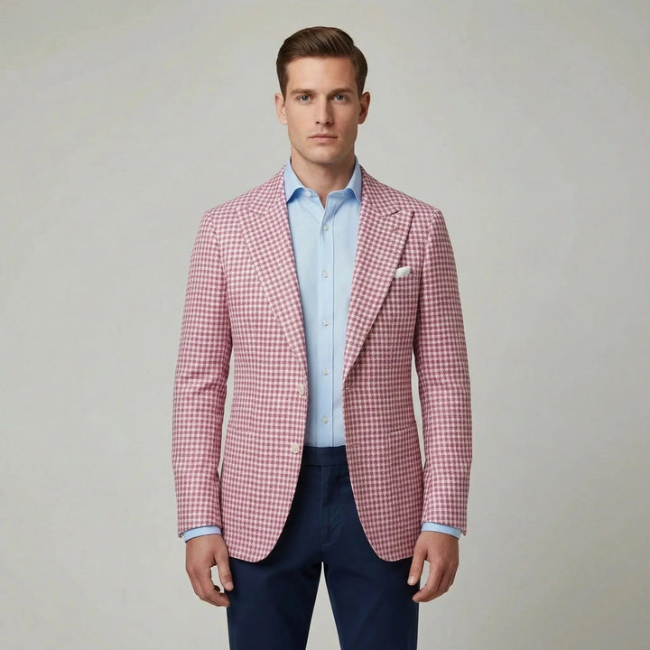Roze, grijs, wit heren pied-de-poule blazer met klassieke revers. Perfect colbert voor diverse zakelijke settings.
