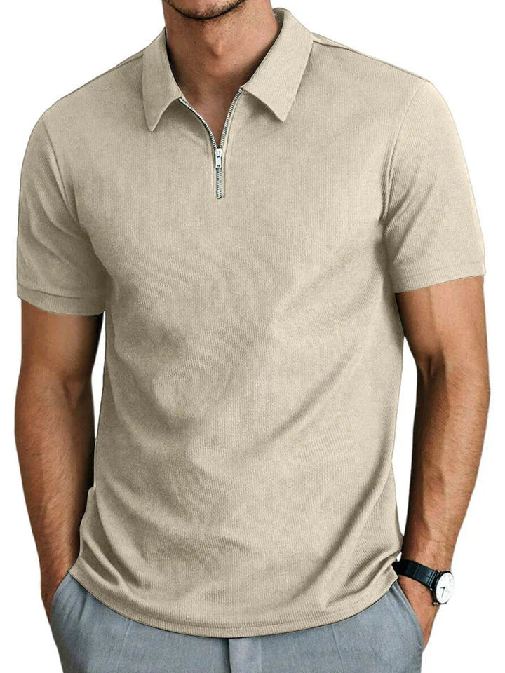 Stijlvolle heren rits polo met korte mouwen en ribstructuur. Perfect voor een casual zomerse look en mannen mode.