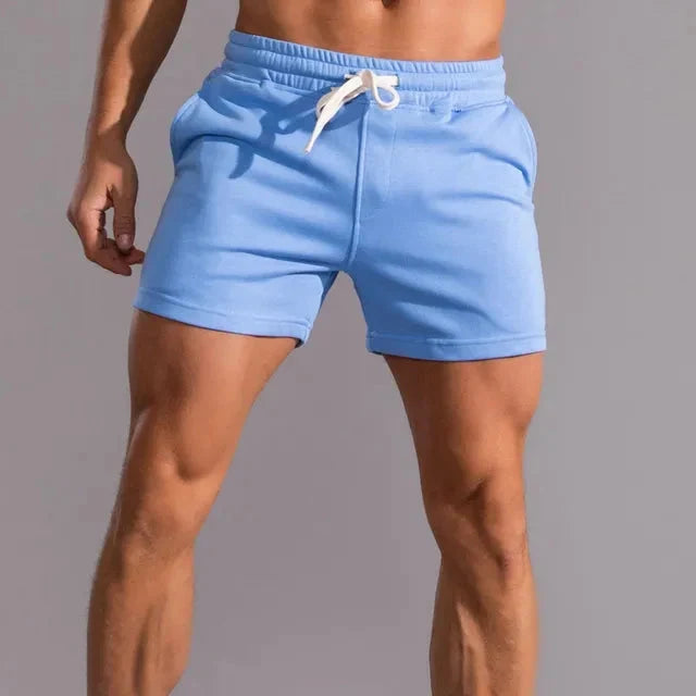 Comfortabele heren shorts met elastische tailleband, trekkoord en handige zijzakken voor een relaxte vrijetijdslook.
