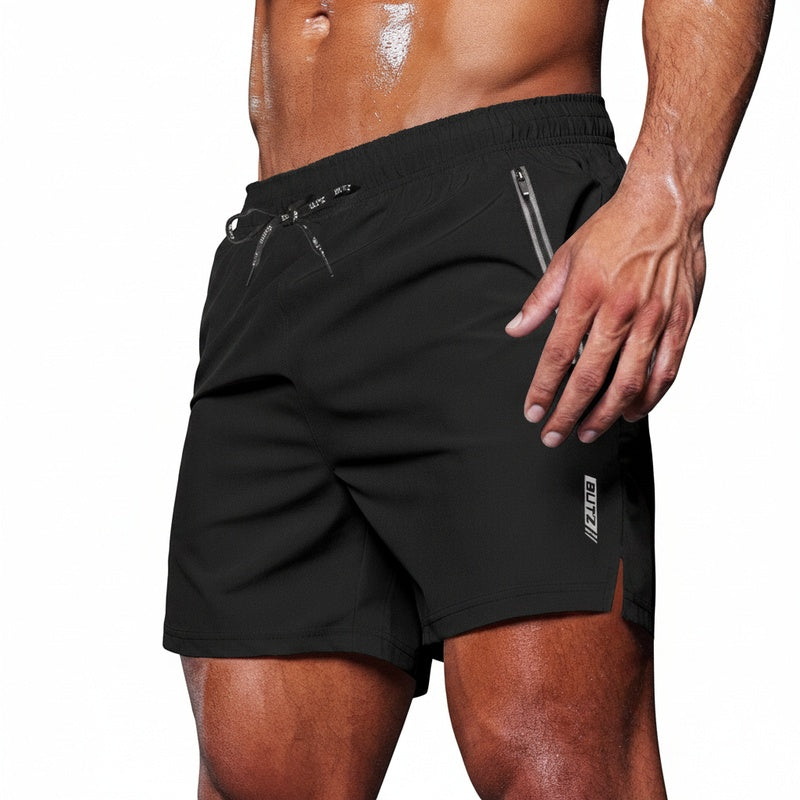 Heren sport shorts in het zwart met rits zakken en elastische taille