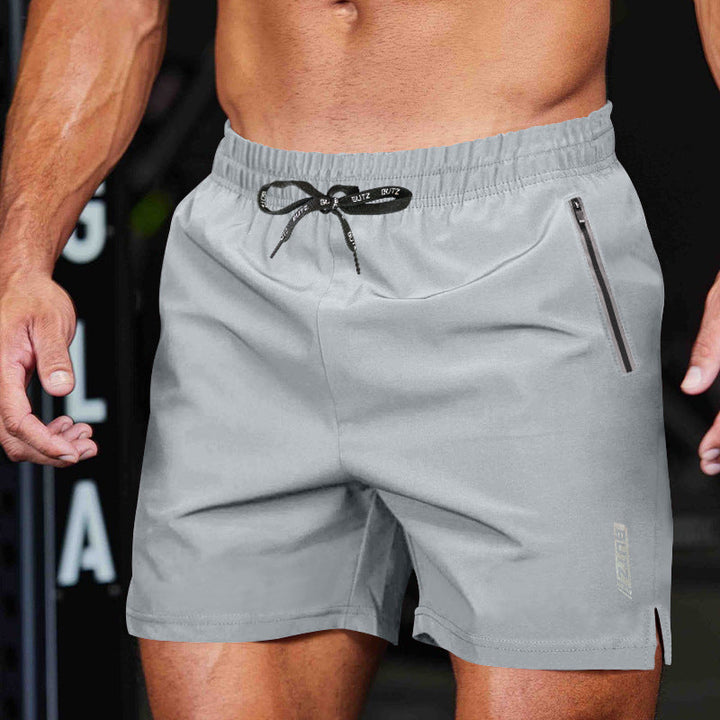 Zwarte heren sport shorts met handige rits zakken voor fitness en gym training