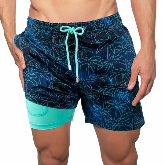 Heren zwembroek met binnenbroek in marineblauw met turquoise palmbomen motief