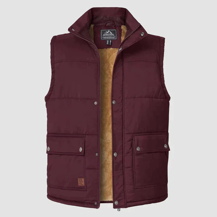 "Herfstige bodywarmer voor heren met meerdere zakken, ideale combinatie van functionaliteit en stijl voor buitenactiviteiten.