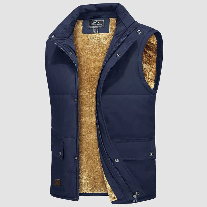 "Herfstige bodywarmer voor heren met meerdere zakken, ideale combinatie van functionaliteit en stijl voor buitenactiviteiten.