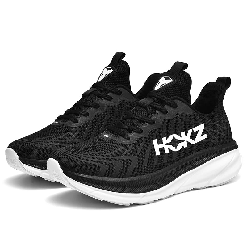 Zwarte unisex hardloopschoenen met witte zool voor training