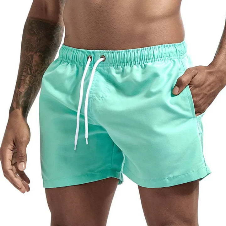 Achterkant van heren zwemshorts, ontworpen voor comfort en bewegingsvrijheid tijdens watersport.
