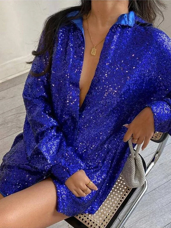 Feestelijke dames oversized blouse met glitters; creëer moeiteloos een glamoureuze en comfortabele look.