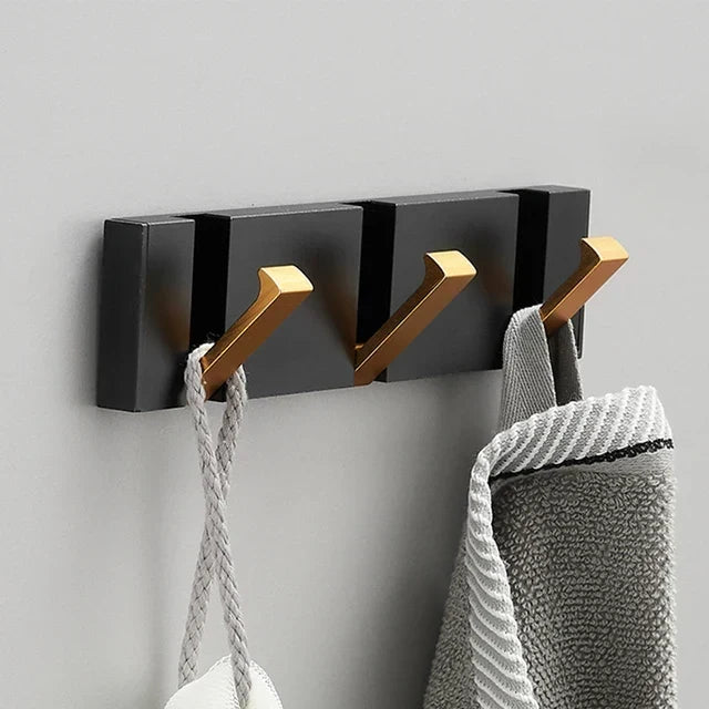 Chique opklapbare wandhaak voor een georganiseerde hal. Luxe en functioneel design.