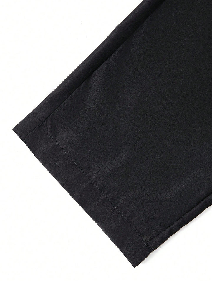 Modieuze casual broek voor heren getoond vanaf de zijkant