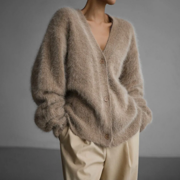 Kasjmier V-hals vest dames, elegant met knopen, oversized pasvorm, zachte stof, veelzijdig voor casual en nette gelegenheden.