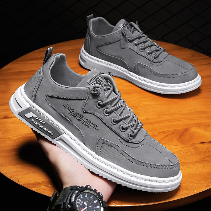 "Klassieke heren sneakers, ademend design, grijs; comfortabel en stijlvol met rubberen zolen voor grip."