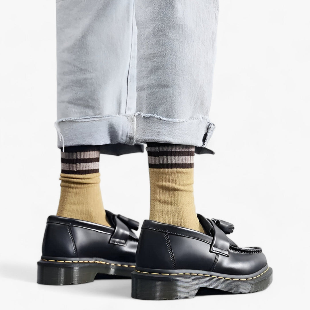 Klassieke loafers met kwastje, tijdloos design, lederen afwerking, geschikt voor zowel casual als formele gelegenheden.