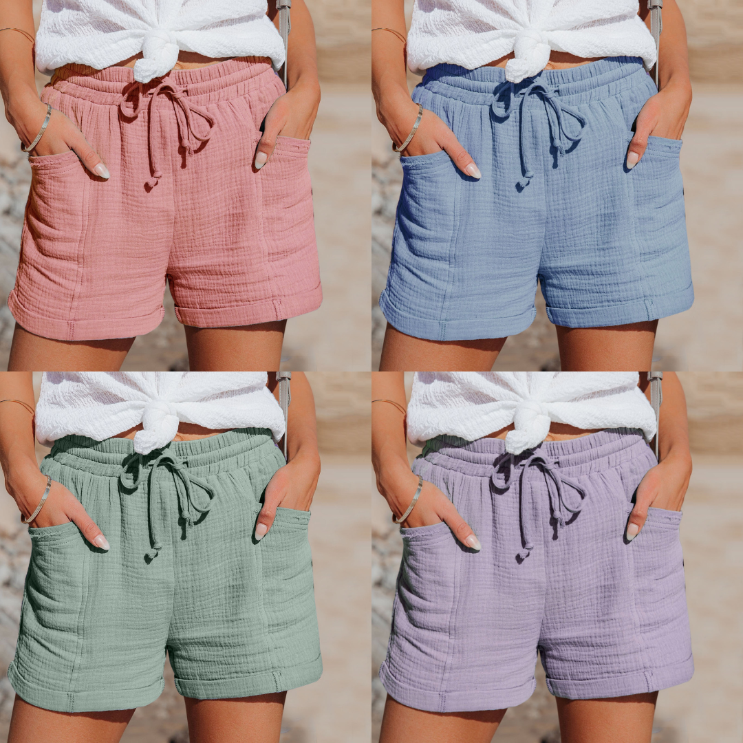 "Korte ademende katoenen dames shorts met verstelbare tailleband en zakken in diverse kleuren, ideaal voor de zomer."