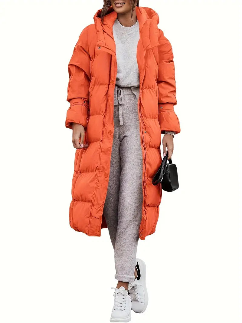 "Lange dames winterjas met waterdicht teddy design, ademende stof en elegante uitstraling, ideaal voor koud weer."