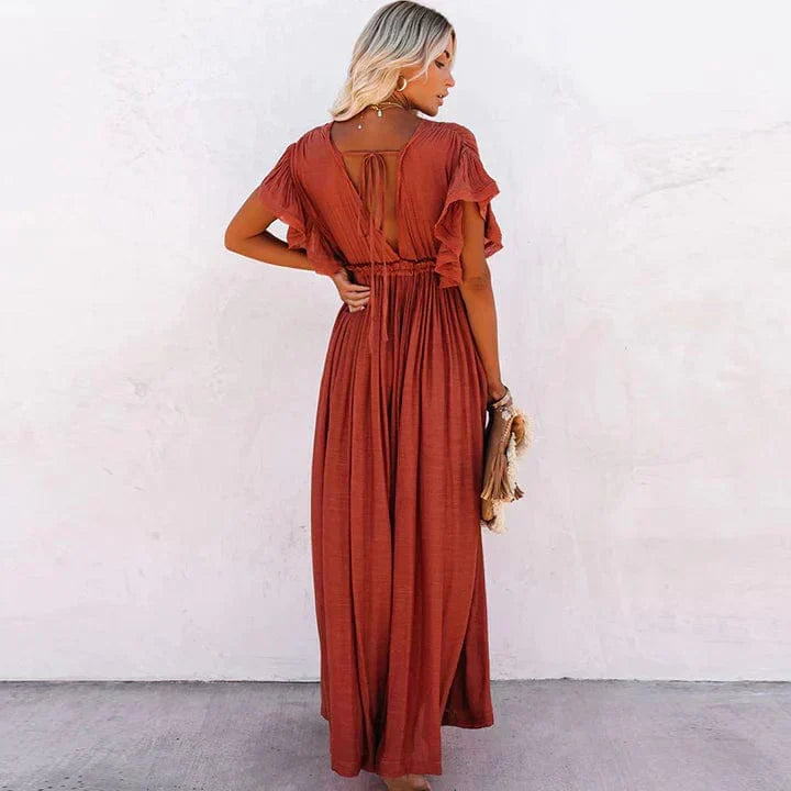"Lange rode strandjurk dames, elegant design, vloeiende snit, katoen-polyester mix, ideaal voor zonnige dagen."