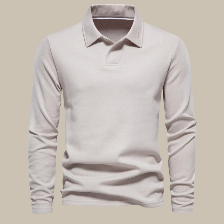 Beige heren lange mouw polo met knopenhals, frontaal op effen achtergrond.
