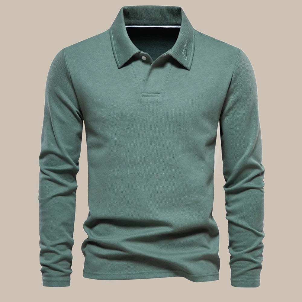 Groene heren lange mouw polo met kraagdetail, comfortabele pasvorm.