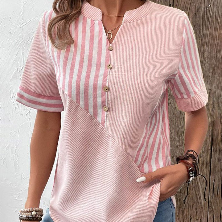 Dames gestreepte blouse in lichtroze met korte mouwen en knoopsluiting vooraanzicht