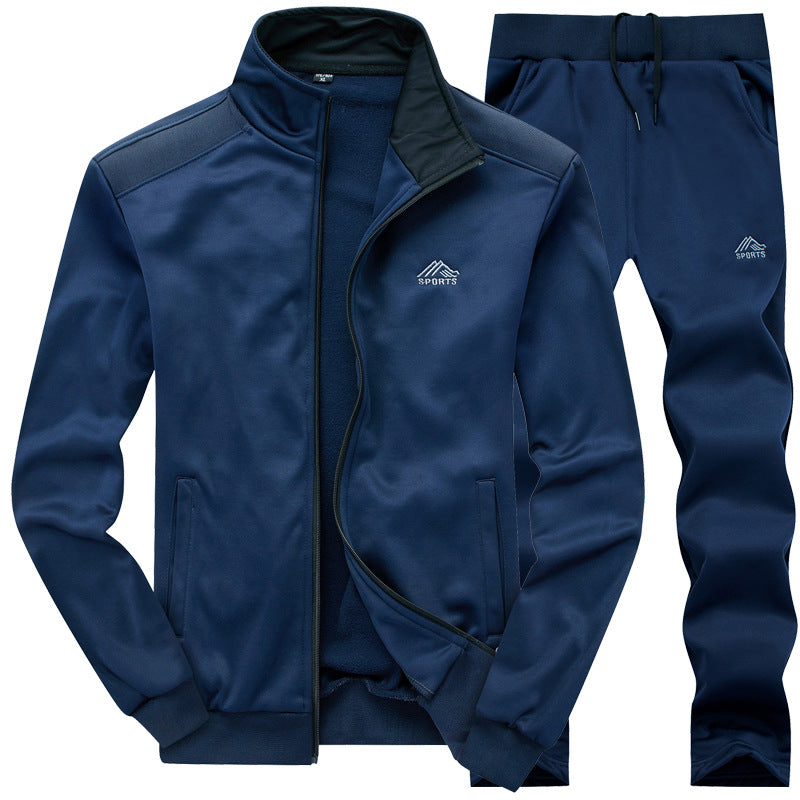 Stijlvol blauw heren trainingspak met gevoerde kraag en zijzakken, perfect voor actieve mannen.