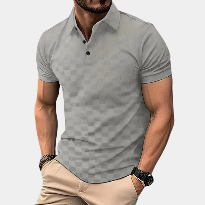 Lichtblauwe polo voor heren met korte mouwen en ademende stof, ideaal voor casual en formele gelegenheden.
