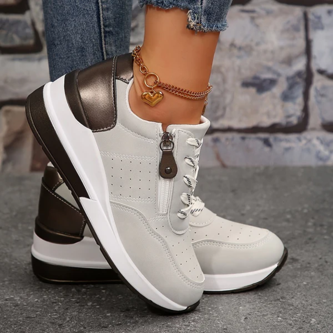 "Lichtgewicht orthopedische dames sneakers met zijrits, beige kleur, comfortabele gedempte zool, modern design."