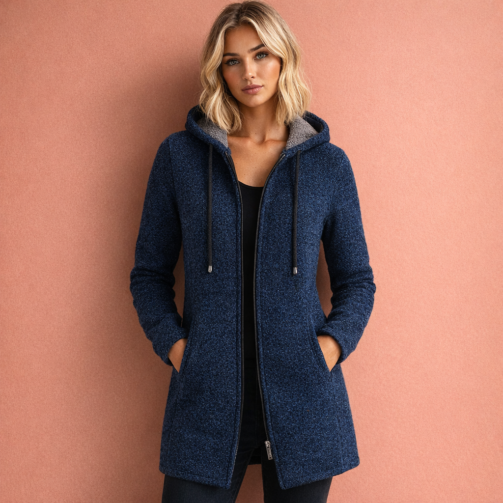 Donkergrijs comfortabel capuchonvest voor dames. Warm en casual bovenkleding voor herfst/winter.