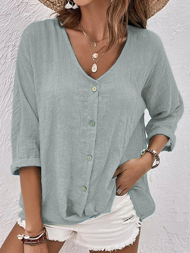 Lichtgroen linnen zomershirt voor dames met losse pasvorm en luchtige uitstraling, perfect voor warme dagen.