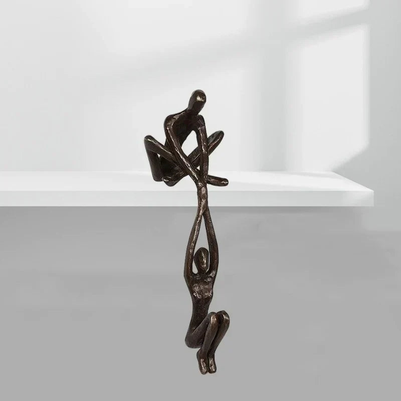 "Liefde en evenwicht sculptuur in bronzen hars, ideaal als unieke huisdecoratie voor tafels of schappen."