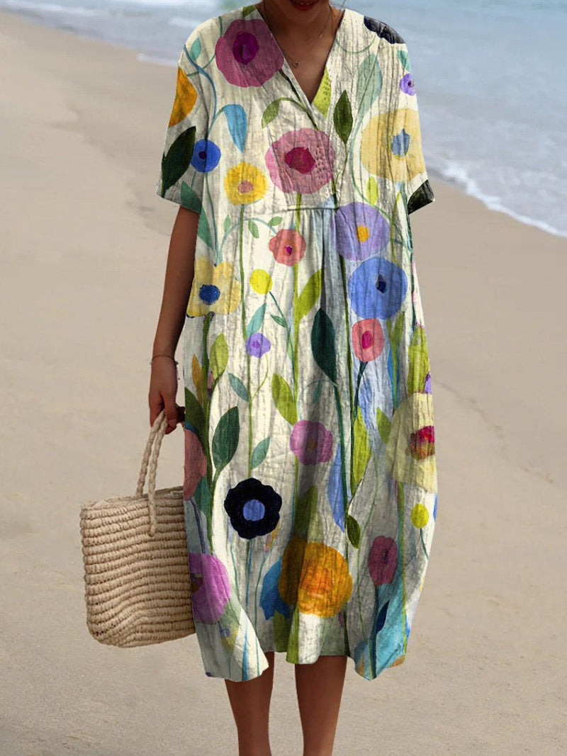 Lotte dames zomerjurk met bloemenprint en V-hals, een elegante en comfortabele jurk voor de zomer.