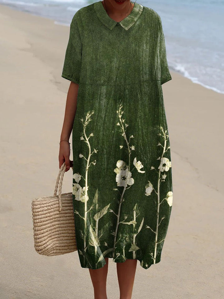 Lotte dames zomerjurk met bloemenprint en V-hals, een elegante en comfortabele jurk voor de zomer.