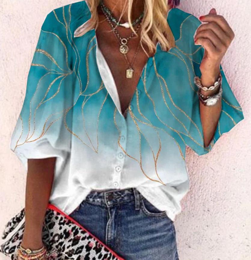 Luchtige boho-chic blouse voor dames met speelse plooien en vrolijke kleuren, perfect voor zomerse dagen.