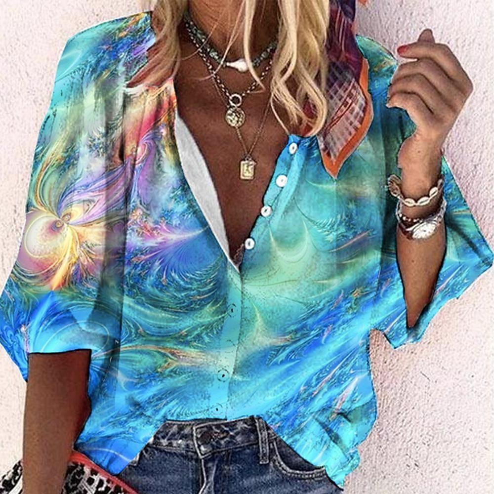 Luchtige boho-chic blouse voor dames met speelse plooien en vrolijke kleuren, perfect voor zomerse dagen.