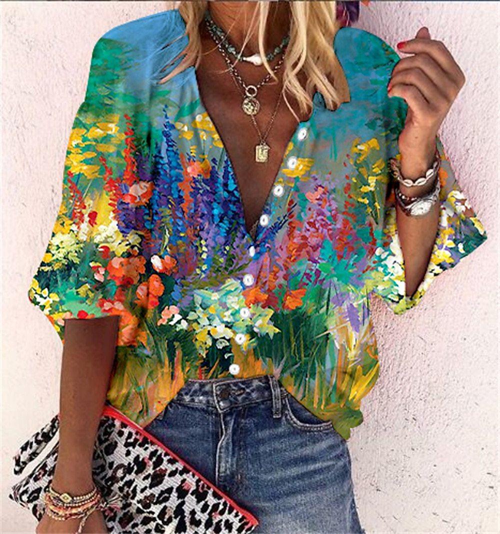 Luchtige boho-chic blouse voor dames met speelse plooien en vrolijke kleuren, perfect voor zomerse dagen.