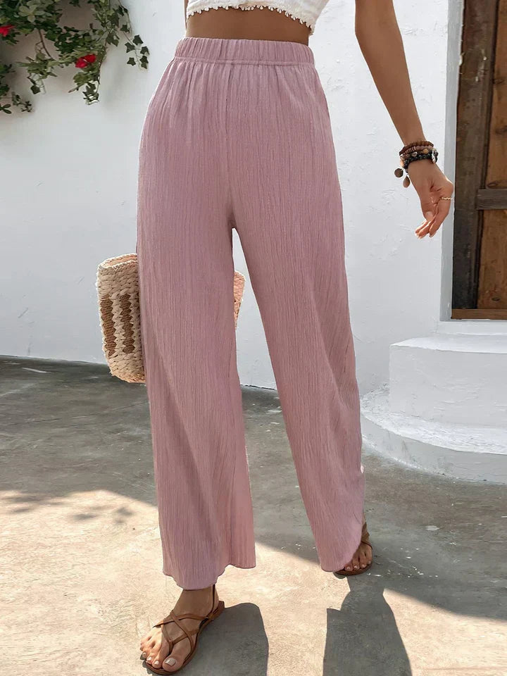 "Luchtige boho-stijl dames palazzo broek met wijde pijpen en elastische tailleband, ideaal voor zomer en casual looks."