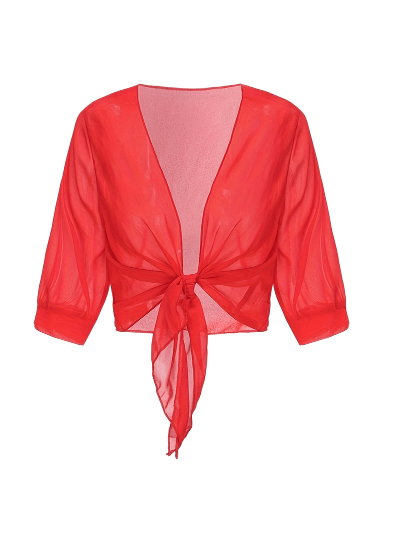 "Luchtige chiffon bolero met striksluiting en korte mouwen, elegant over zomeroutfits. Ideaal voor warme dagen en koele avond